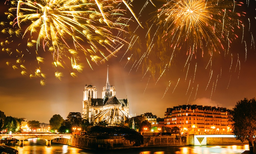 Image 1: Celebrate New Year's Eve 2024 w/ Unforgettable Trip to Paris or Bruges