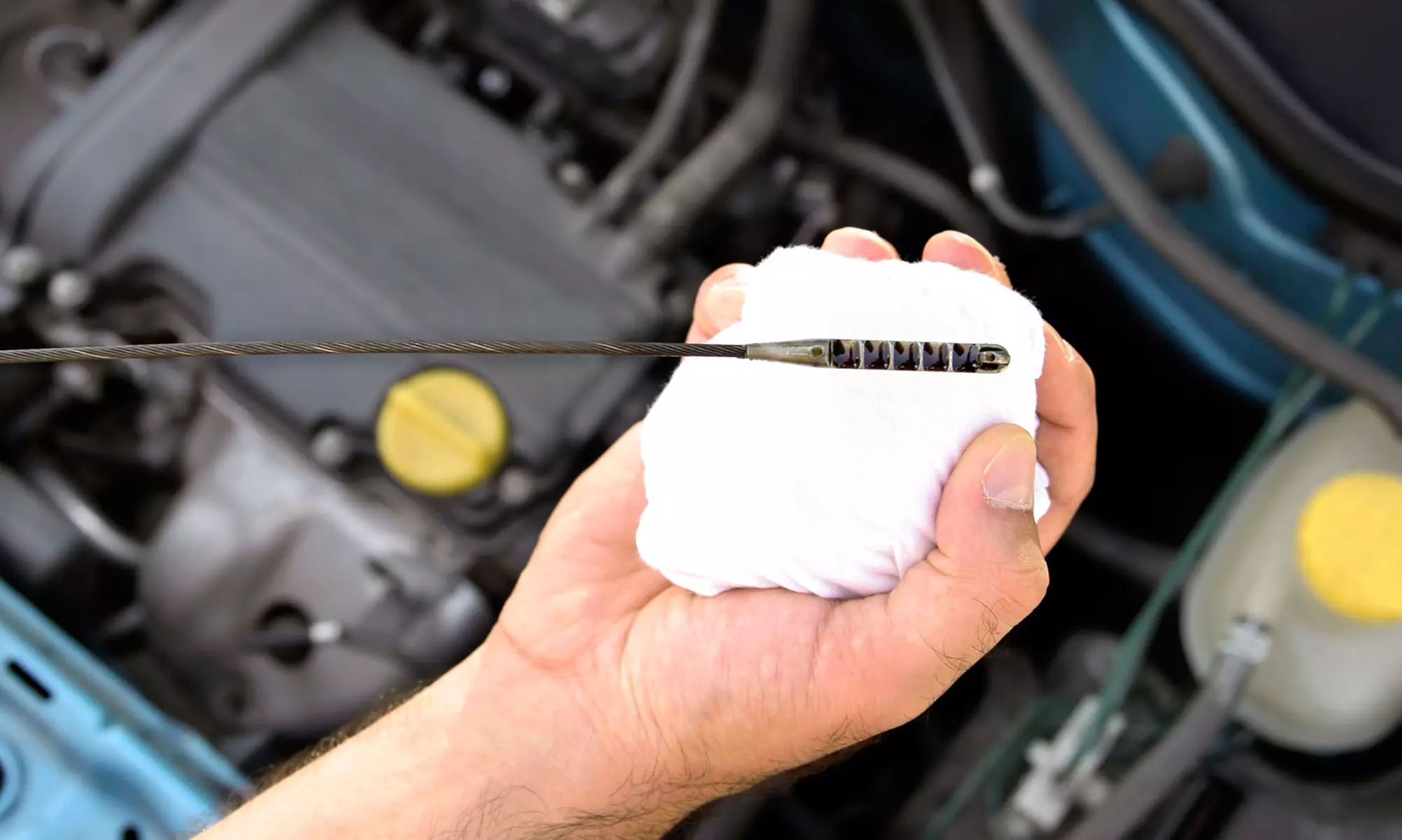 $29 for an Oil Change, Tire Rotation, Fluid Top-Off, and Inspection at Kelly's Brake & Auto Service ($82.95 Value) - Primary Image