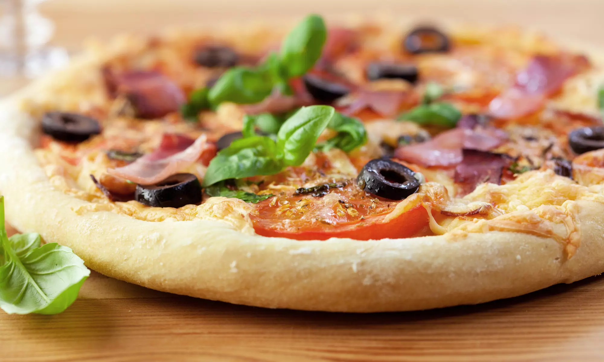 $16 for Two Groupons, Each Good for Two Medium Pizzas at Tenney's Pizza (Up to $32 Total Value) - Primary Image