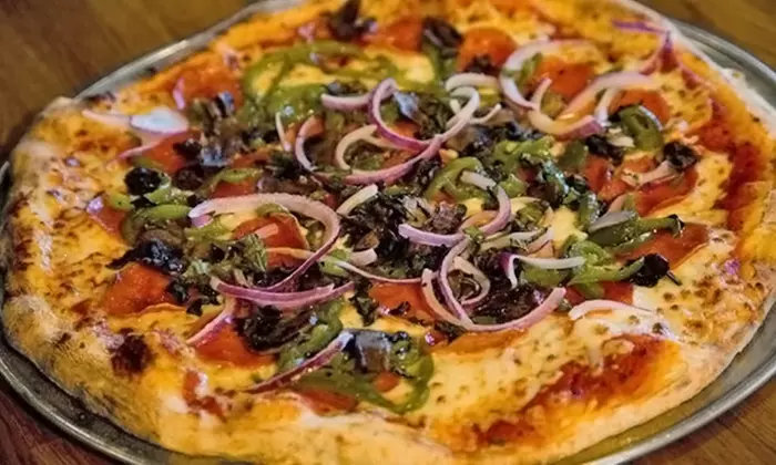 Pizza Fare or Large Specialty Pizza with Garlic Knots and Large Salad at Buckhead Pizza Co. (Up to 45% Off) - Primary Image