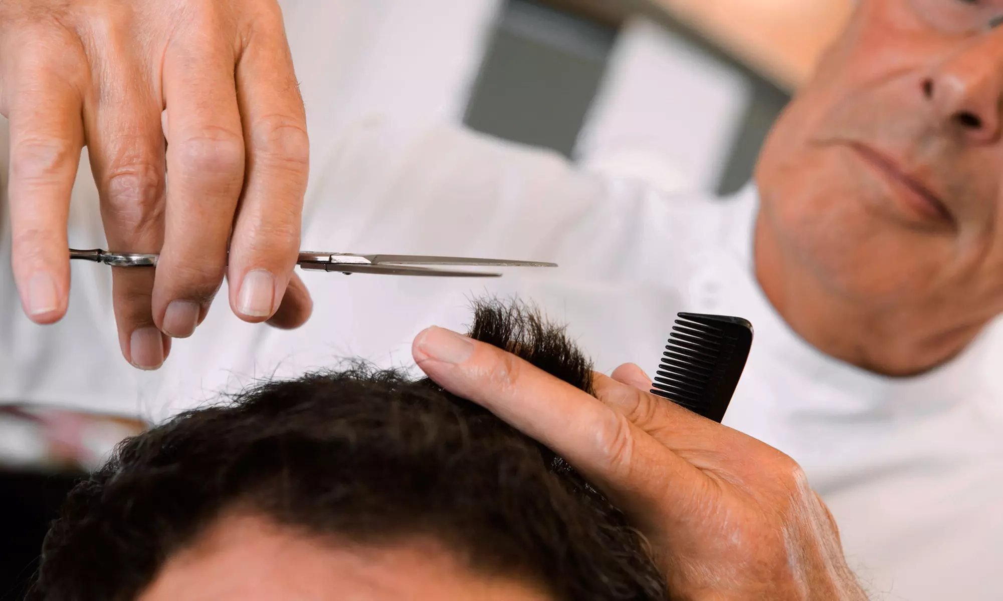 Men's Shampoo, Haircut, Style, and Optional Razor Shave from Donato at Eagle Beauty Salon (Half Off) - Primary Image