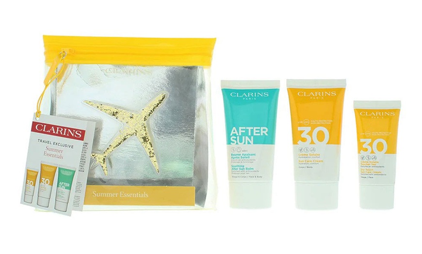 Image 1: Clarins Essential Suncare Travel Set