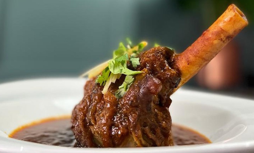 Image 12: Up to 67% Off on Indian Cuisine at Dhoom Dhaam Restaurant and Bar