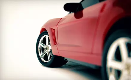 $30 for a Four-Wheel Alignment at OK Tire ($129.95 Value) - Primary Image