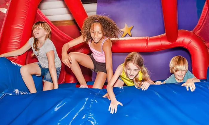 Three, Five, or Ten Open Jump Passes at Pump It Up (Up to 56% Off). Three Locations Available. - Primary Image