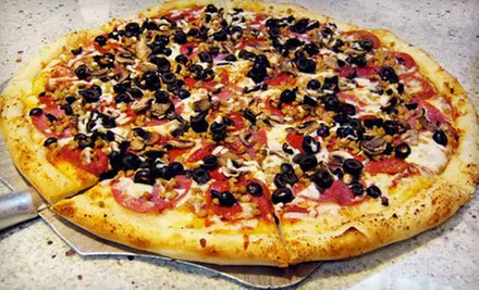 $10 for $20 Worth of Pizza, Pasta, Sandwiches, and Wings at Pizza Schmizza in Wilsonville - Primary Image