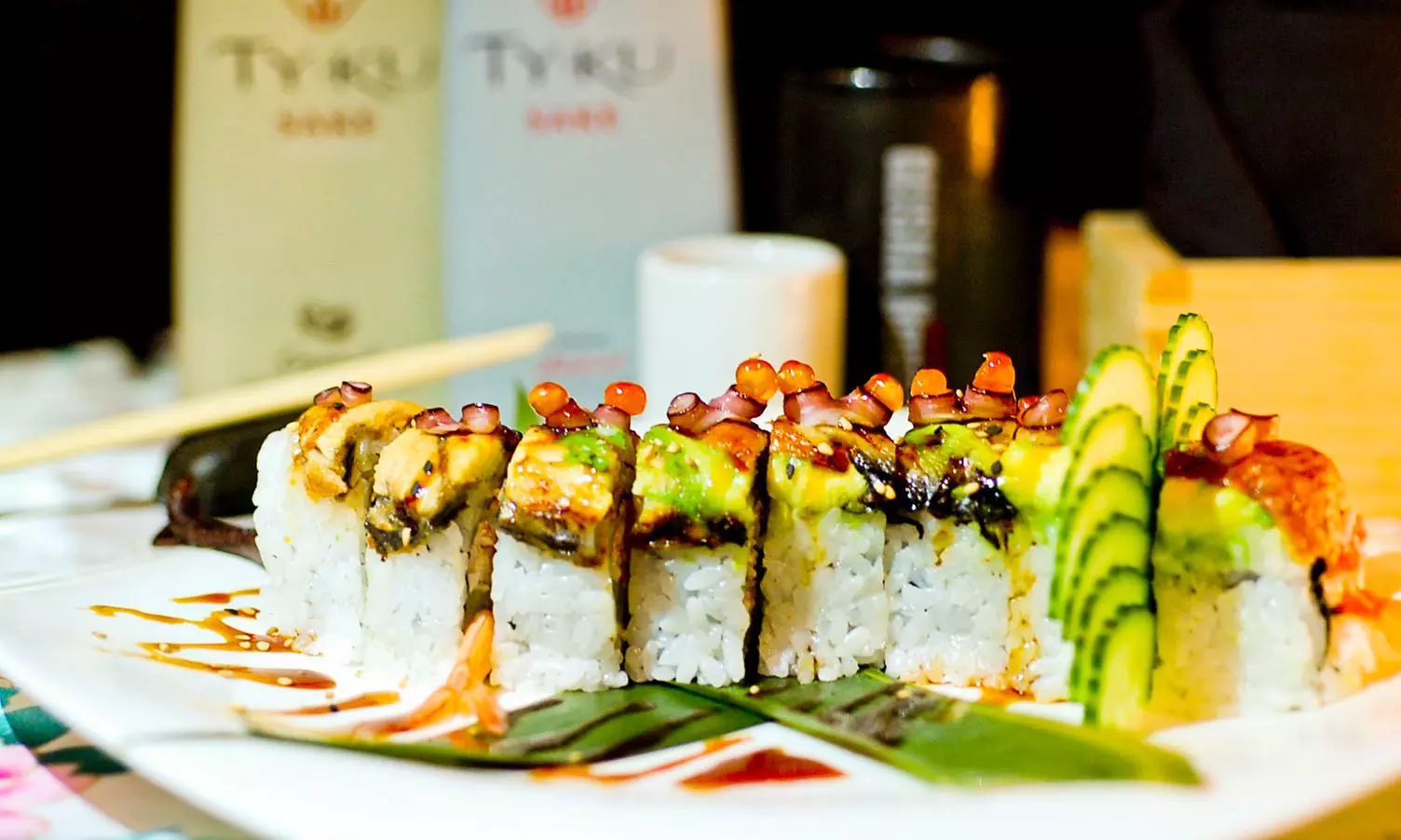$30 for Two Sushi Rolls and One Bottle of Sake at Geisha House Steak & Sushi (Up to $49.90 Total Value) - Primary Image