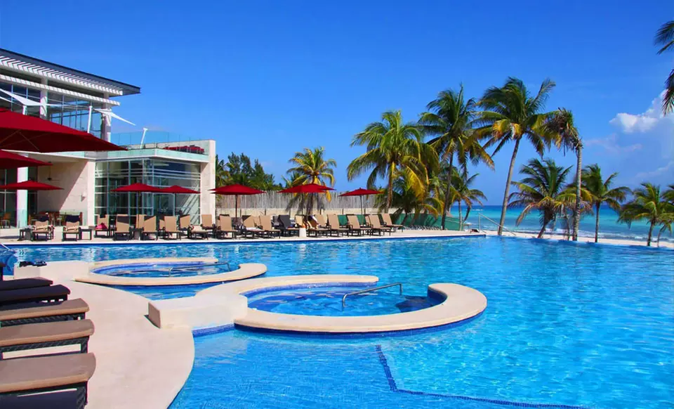 Six-Day, All-Inclusive Beach Vacation with Airfare and 4.5-star Accommodations at Azul Fives Hotel from Travel By Jen - Primary Image