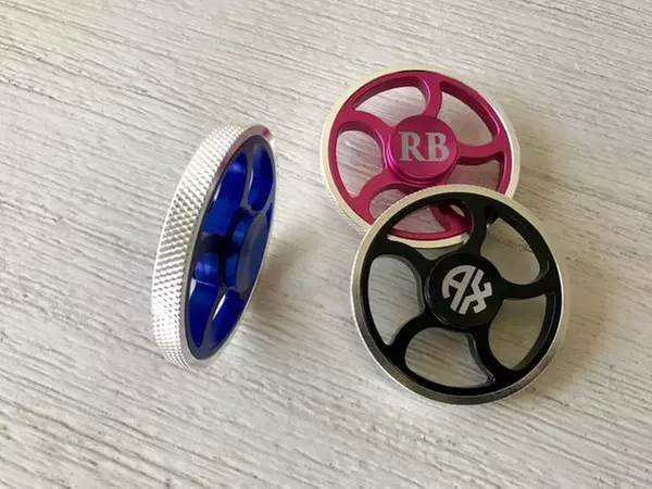 One, Two, Three, Five, or Ten Premium Round Personalized Fidget Spinners from Qualtry (Up to 71% Off) - Second Medium