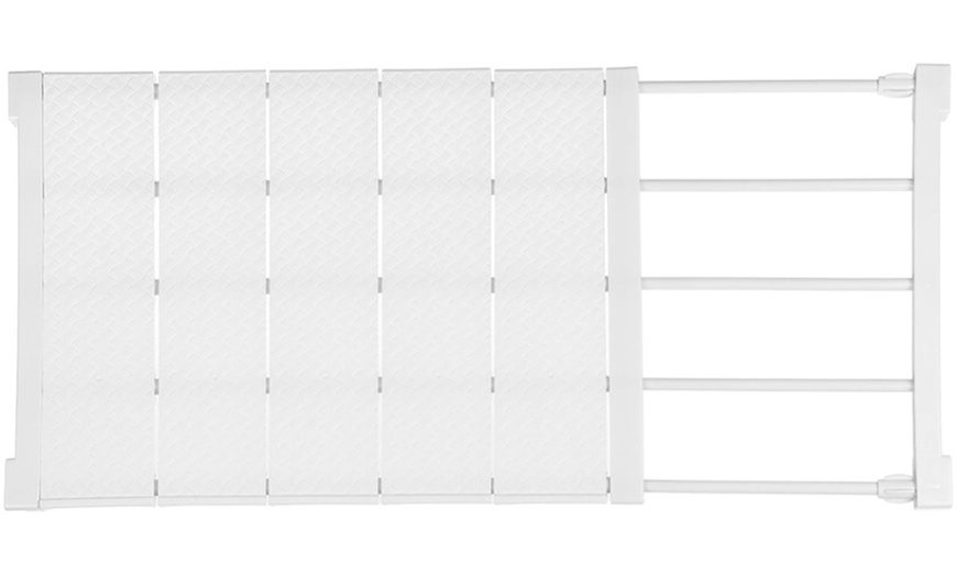 Image 4: Expandable Closet with Tension Shelf Rods and Storage Layer Dividers