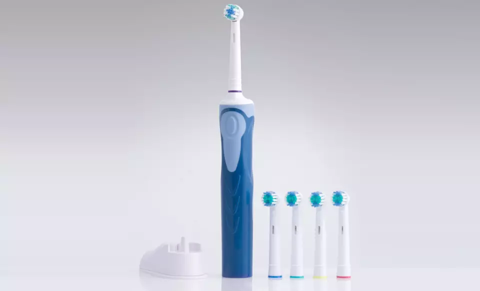 Professional Sonic-Spin Toothbrush with 4 Extra Heads. Multiple Colors Available. - Second Medium