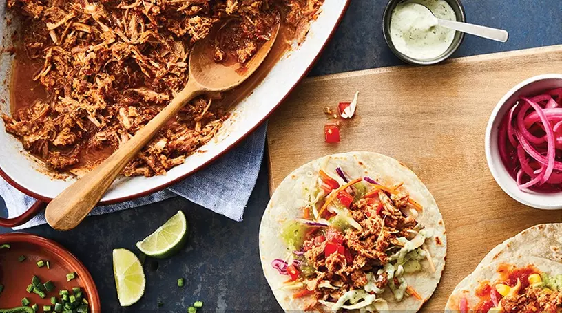C$22 for Mexican Food at Quesada Burritos and Tacos, Takeout and Dine-In (C$30 Value) - Second Medium