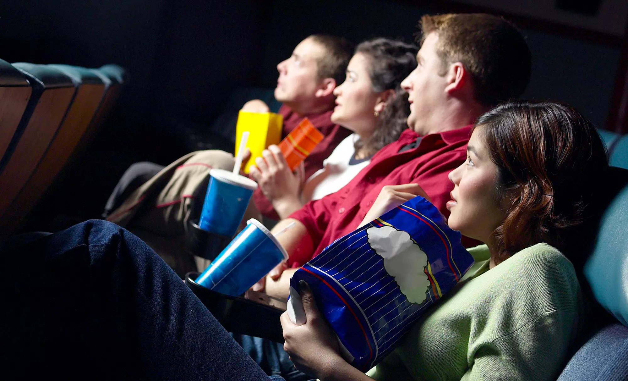 1, 5, or 10 Movie Tickets with Popcorn at Spotlight Theaters Front Street (50% Off) - Primary Image
