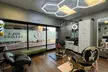 The Ultimate Grooming Package for Men - Precision Haircuts, Beard Trims, Waxing, or More (Up to 43% Off) - Second Medium