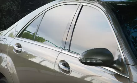 CarbonXP Tinting Package with Auto Tint, Sun Strip, and Roll-Down Treatment at The Tint Guy in St. Charles (Up to Half Off) - Primary Image