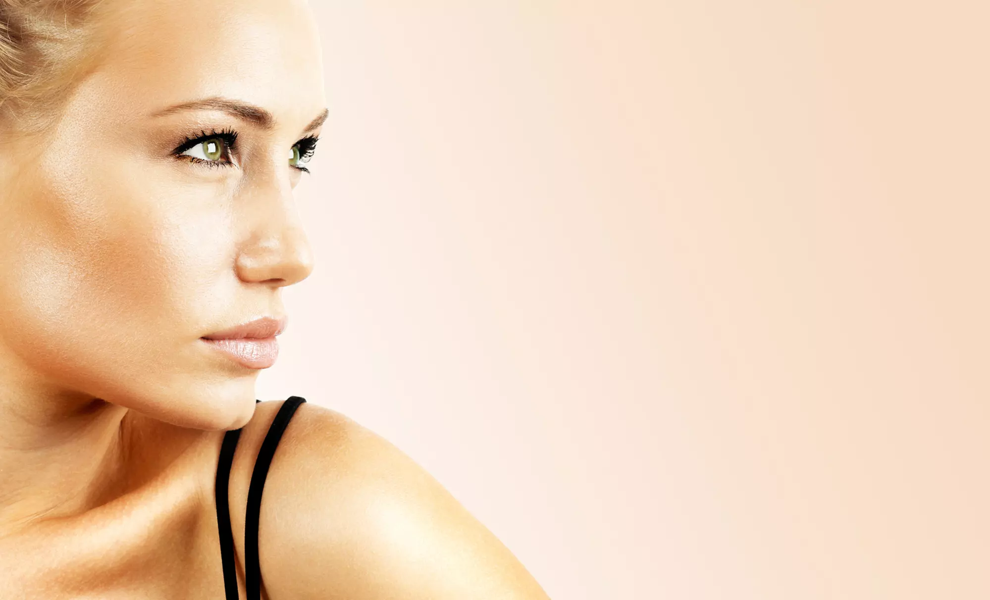 Tanning Starter Kit, Level 4 Bed Tanning, Spray Tan, or Month of Standard Tanning at J2 Tanning (Up to 60% Off) - Primary Image