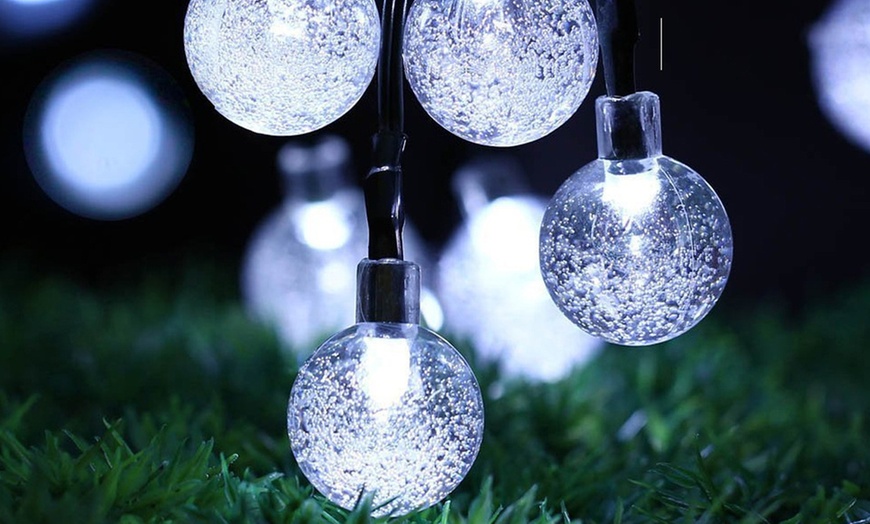 Image 5: One or Two Sets of 50-LED Solar Garden String Lights