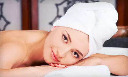 Manicure and Brow Shaping or a Custom Facial Package at Tasha’s Day Spa (Up to 52% Off) - Primary Image