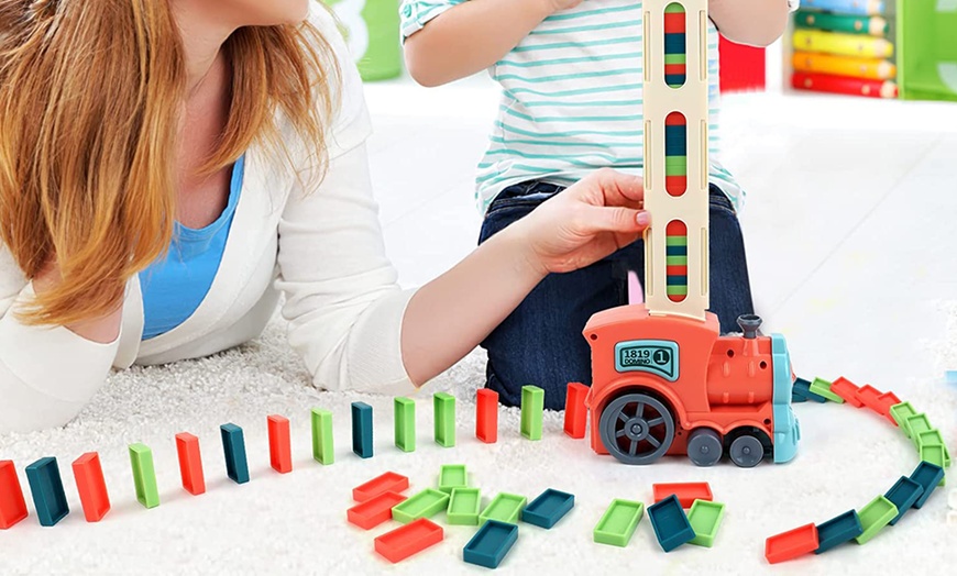 Image 3: Automatic Domino Laying Electric Train Toy Set