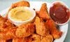 $15 for $25 Worth of Wings and More or 50-Wing Bucket with Soda at Atomic Wings (40% Off)