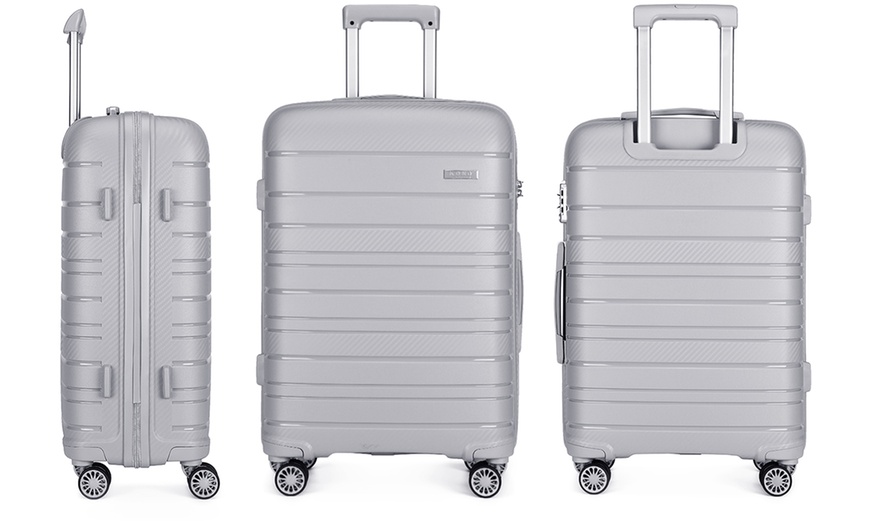 Image 23: Four Piece Travel Suitcase Set