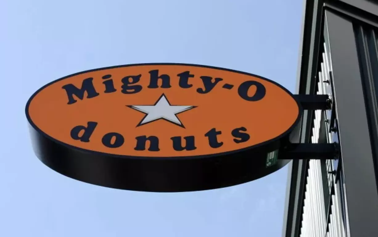 Up to a Dozen Donuts, 4 Donuts & 2 Drinks or $50 to Spend