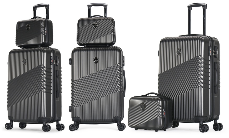 Image 20: Four-Piece Luggage Set