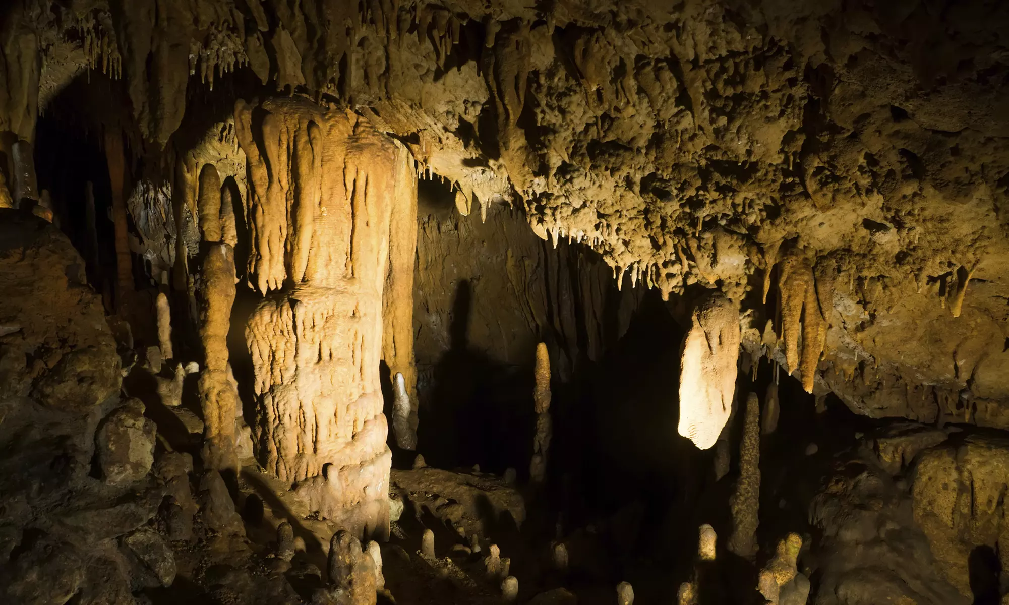 Half-Day Caving Adventure for One, Two, or Six from River and Earth Adventures (Up to 53% Off) - Primary Image