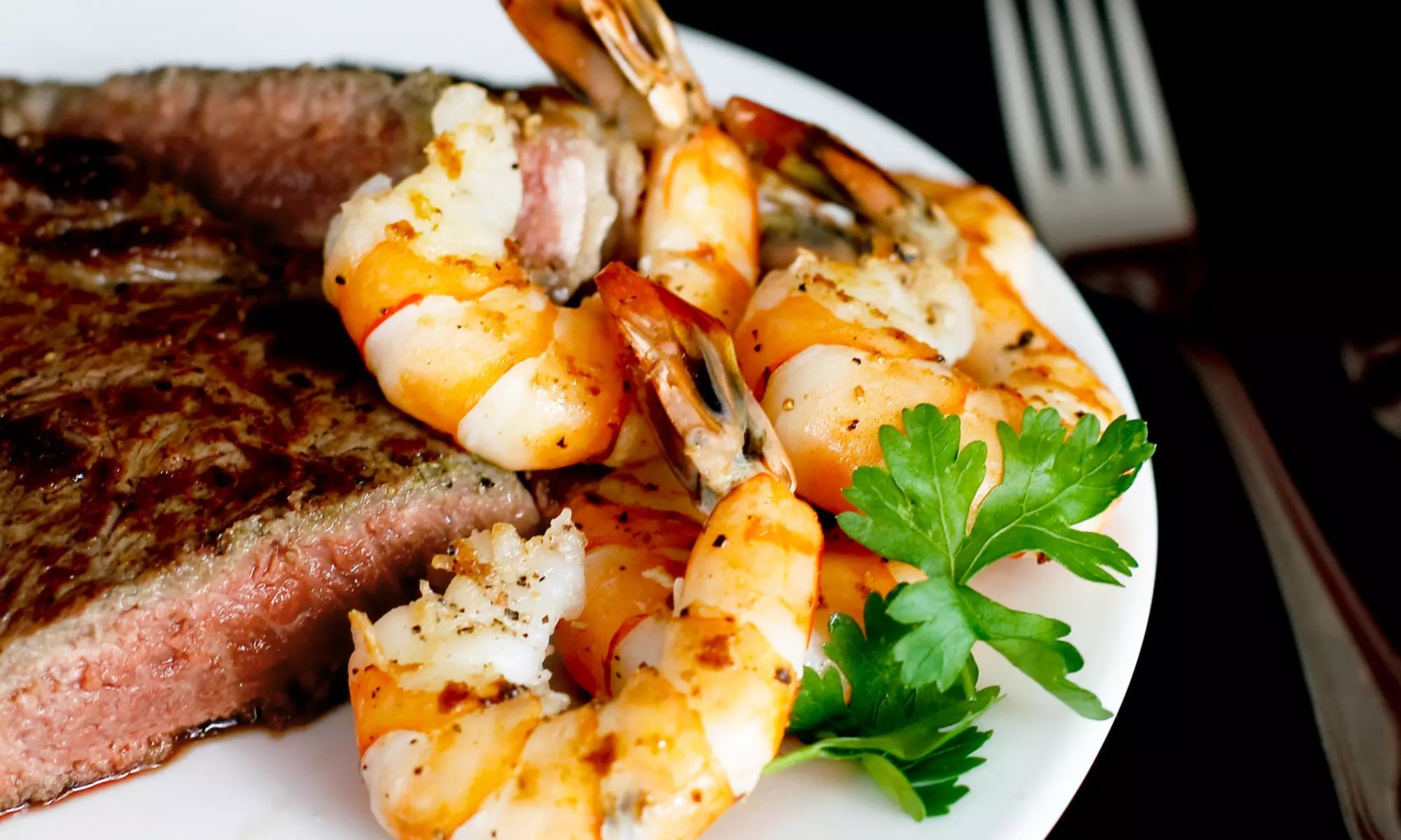 Upscale Surf n' Turf Dinner for Two or Four at The Waterfront Grill & Pizzeria (Up to 48% Off)  - Primary Image