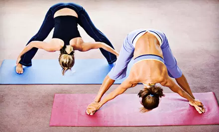 One Month of Unlimited Yoga Classes or Ten-Class Pass at Bikram Yoga Tri-City (Up to 76% Off) - Primary Image