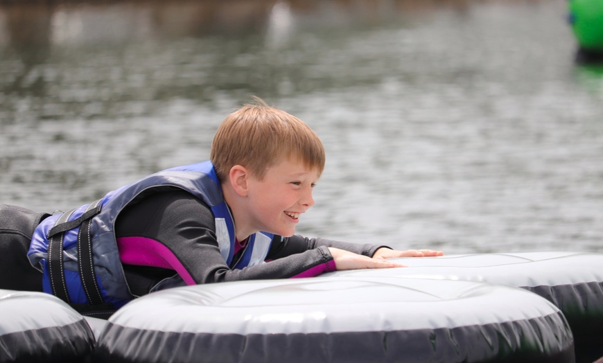 Image 7: Aqua Park Entrance with Wetsuit