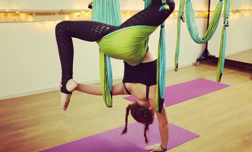 Image 1: Yoga, Pole, or Aeriel Trapeze Classes at Urban Shanti