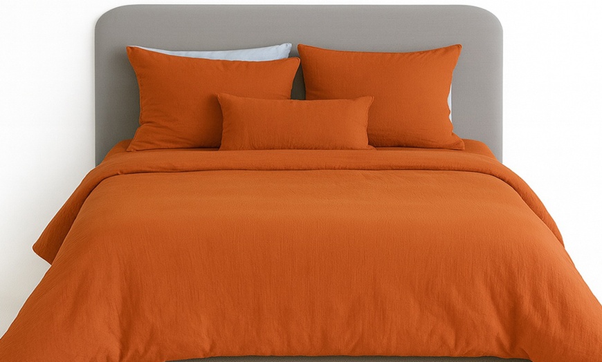 Image 11: Completo lenzuola matrimoniale in tinta unita 100% cotone