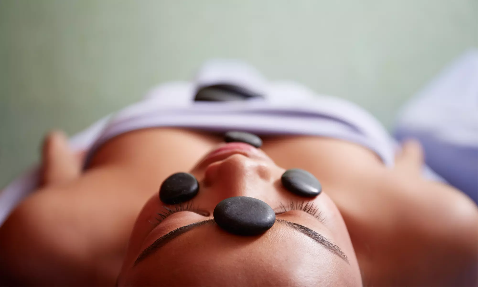 Spa Packages with 60- or 90-Minute Aromatherapy Massage and Mini Hot-Stone Treatment (Up to 49% Off) - Primary Image