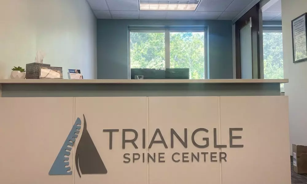 Triangle Spine Center: One or Three Sessions 60 or 90-Min Swedish, Deep Tissue or Sports Massage(Up to 30% Off)