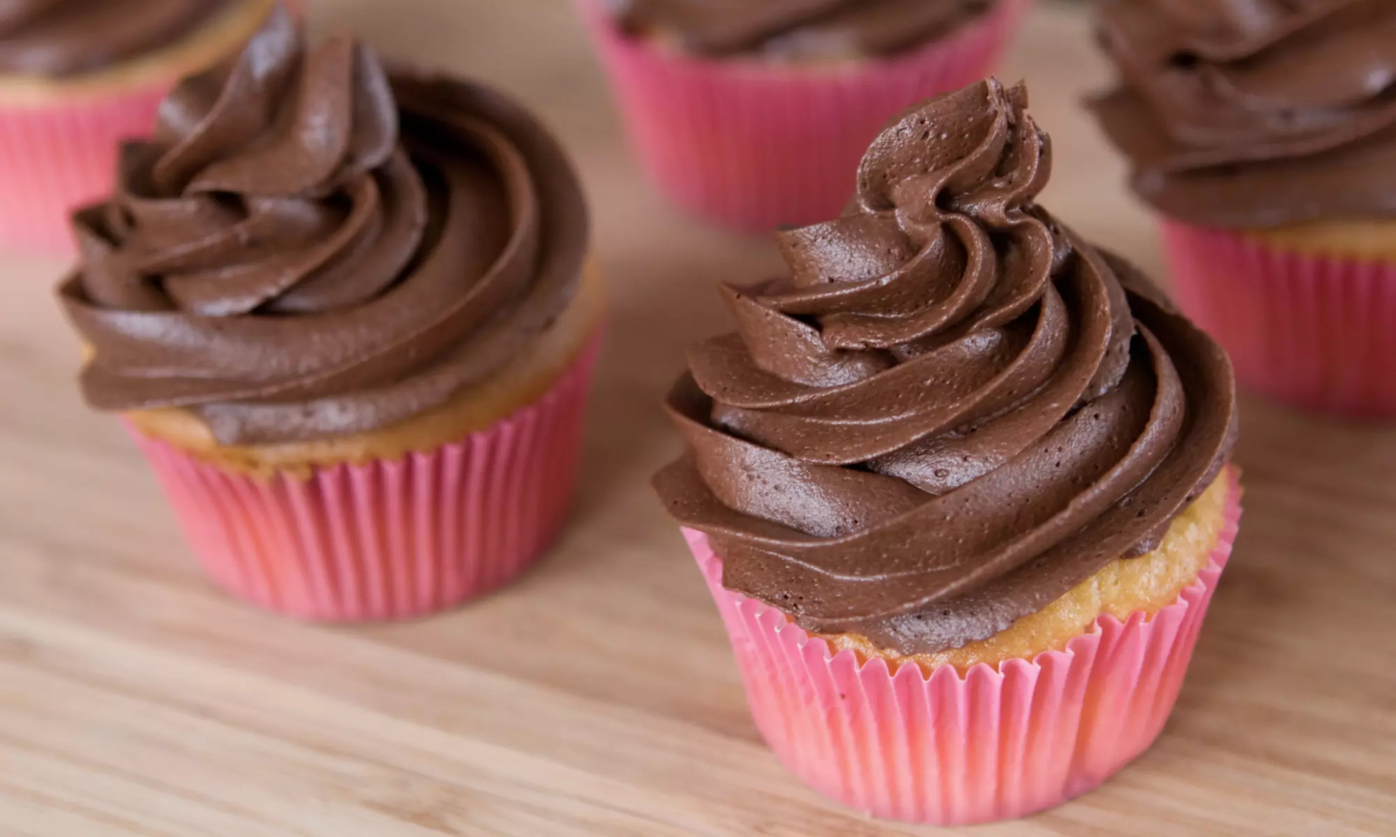 One Dozen Cupcakes or Two Dozen Cake Pops by Delightful Treats (47% Off)  - Primary Image