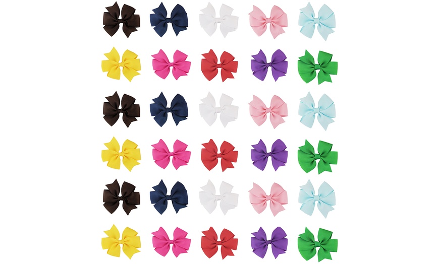 Image 14: Up to 40-Pack Assorted Colour Hair Bows with Clips for Kids
