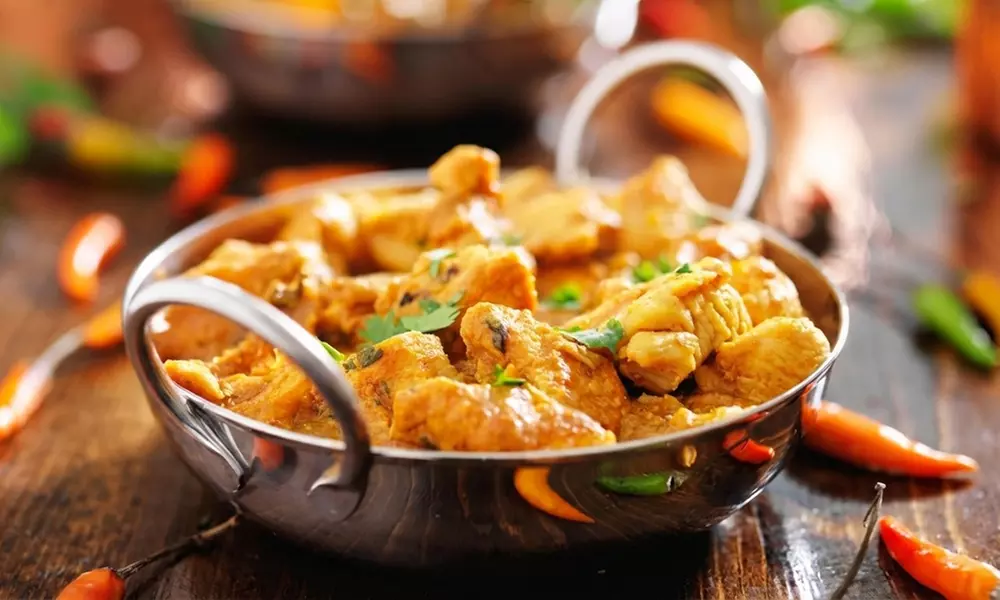 Three Course Indian Meal with Bottle of Wine for Two or Four People