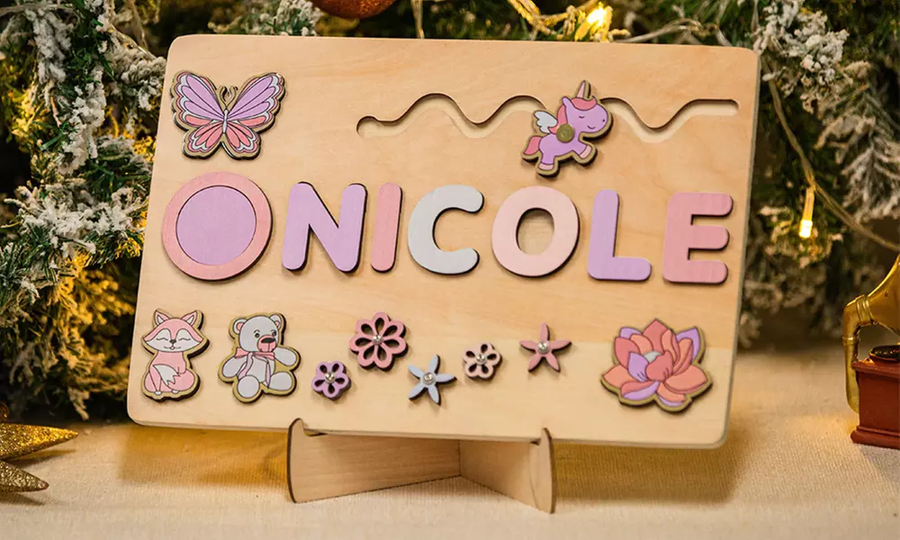 Gepersonaliseerd babycadeau: naam-puzzelbord