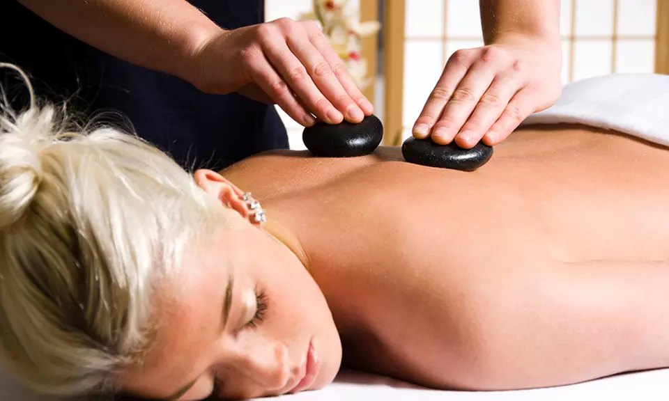 Unwind and Rejuvenate with CBD-Infused Hot Stone Massage at Fort Collins Massage and Acupuncture (Up to 34% Off) - Primary Image