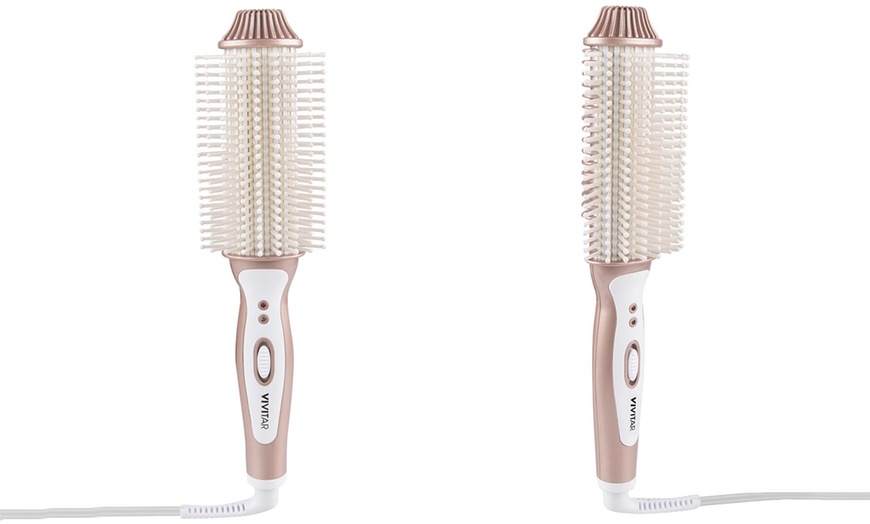 Vivitar simply beautiful hotsell heated volumizing hair brush