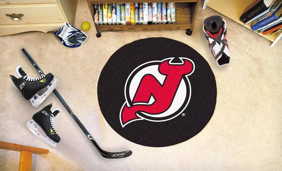 $19.99 for a Fan Mat 27" NHL Hockey Puck Mat ($39.99 List Price). 30 Teams Available. Free Shipping and Returns - Second Medium