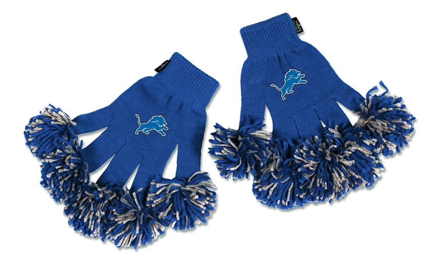 gloves with pom poms at fingertips