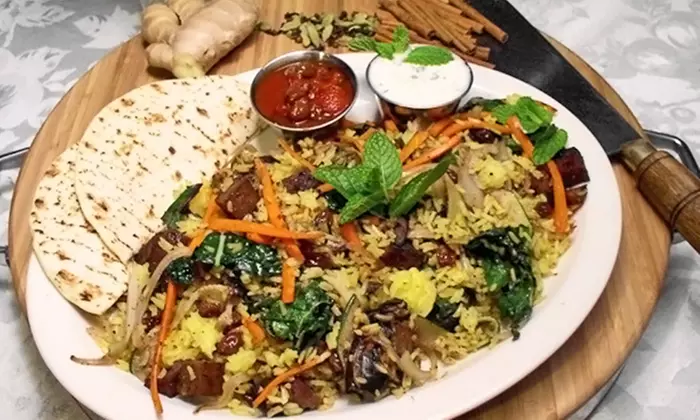 Up to 27% Off on American Cuisine at Dharma's Restaurant - Primary Image