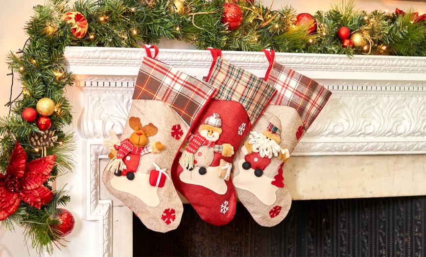 Image 1: Up to 12 Christmas Stockings