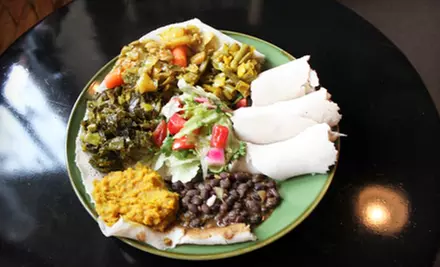 Ethiopian Dinner for Two or Four with Vegan or Spiced Chicken Platters at GoJo Ethiopian Cuisine (Up to 52% Off) - Primary Image