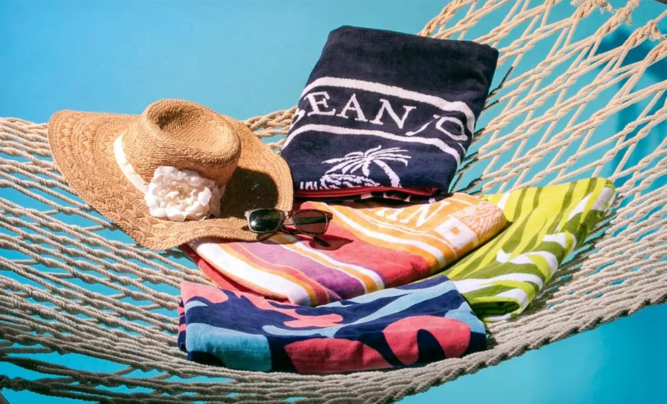 $12.99 for a 34"x64" or 36"x70" Caribbean Joe Beach Towel ($44.99 List Price). Multiple Designs Available. Free Returns. - Primary Image