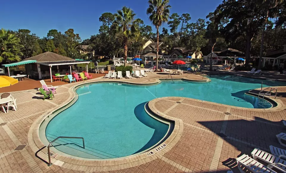 Stay with Daily Housekeeping at Oak Plantation Resort in Kissimmee, FL. Dates into December. - Primary Image