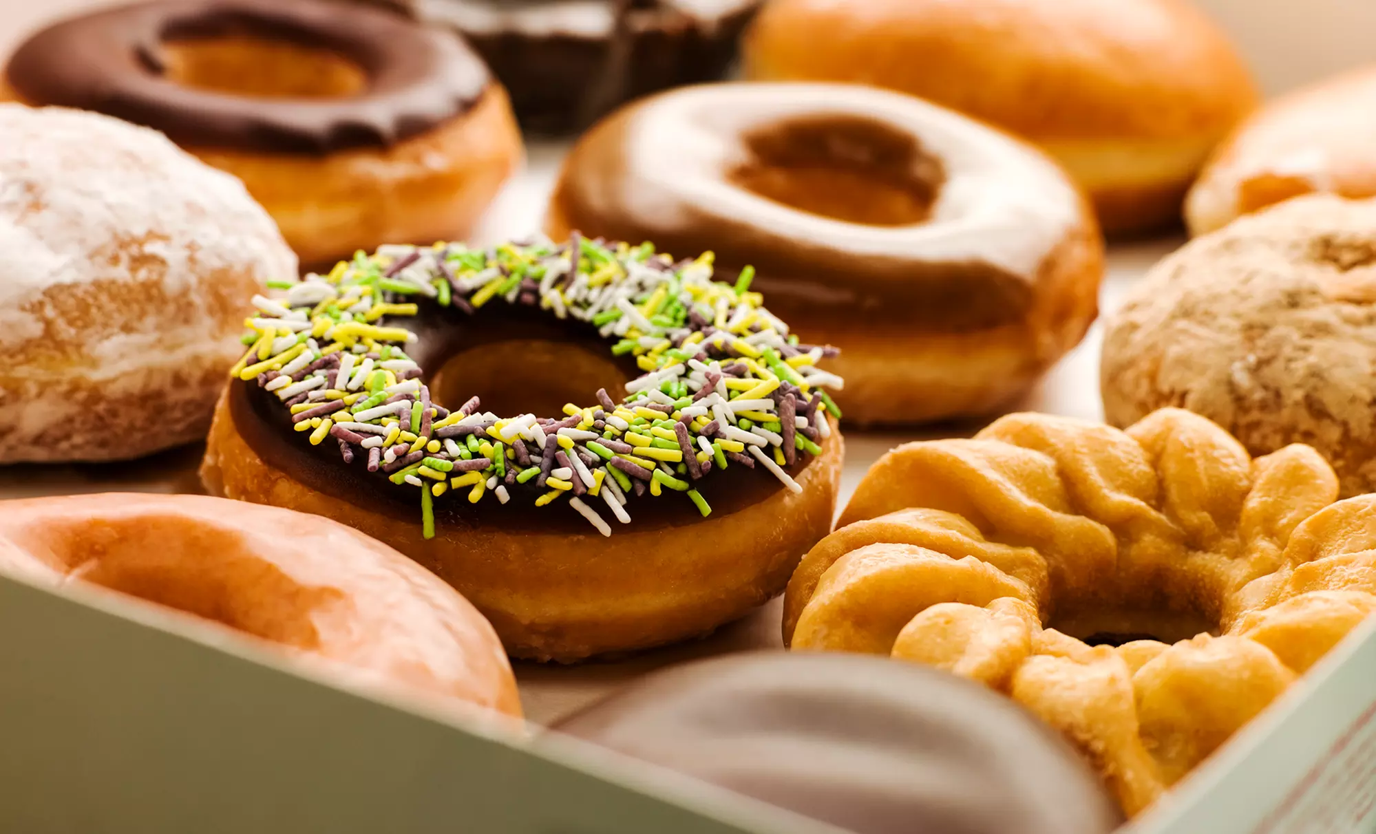 Two Dozen Donuts, or Two Groupons, Each Good for One Dozen Donuts at Simply Splendid Donuts & Kolaches (46% Off) - Primary Image