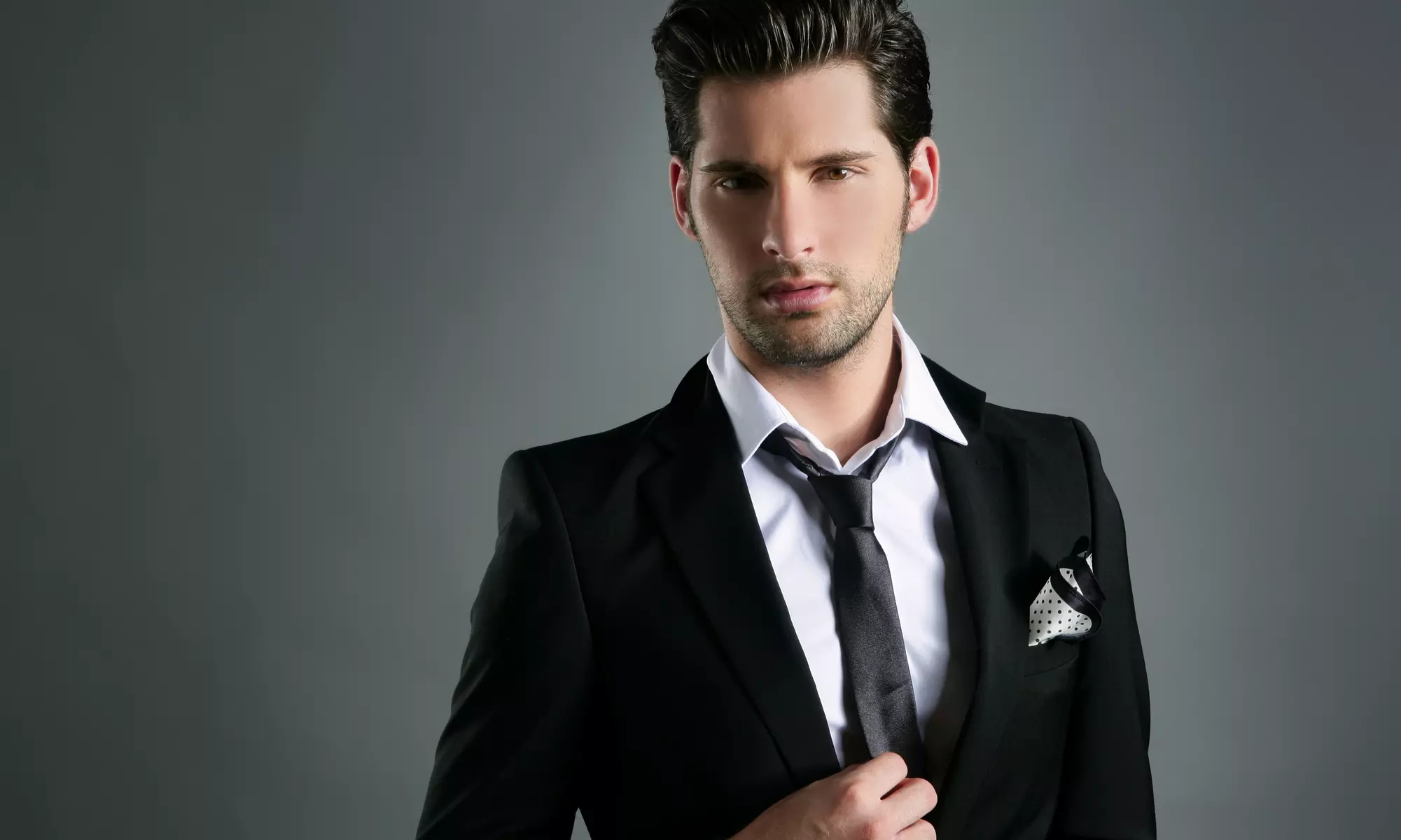 One or Three Men's Haircut Packages with Cut, Scalp Massage, and Hot-Lather Neck Shave at The Barbers (Half Off) - Primary Image